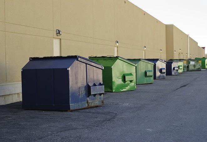 construction dumpsters on a worksite surrounded by caution tape in Allegheny PA